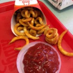 Chowing down on some Arby's curly fries