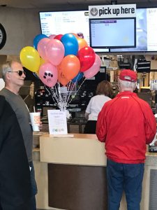 Old crowding the McDonald's counter