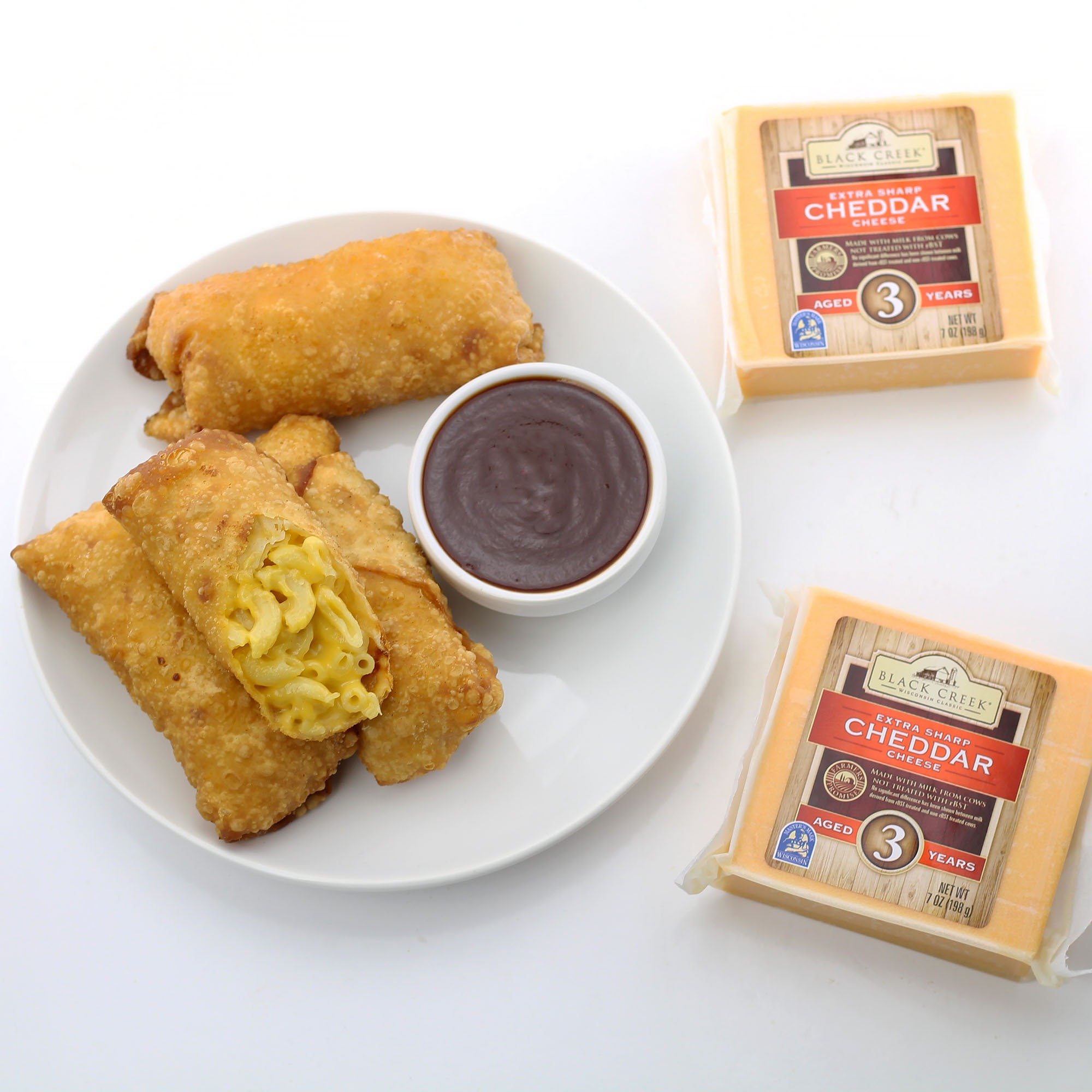 https://dudefoods.com/wp-content/uploads/2020/12/MacAndCheeseEggRolls2.jpg