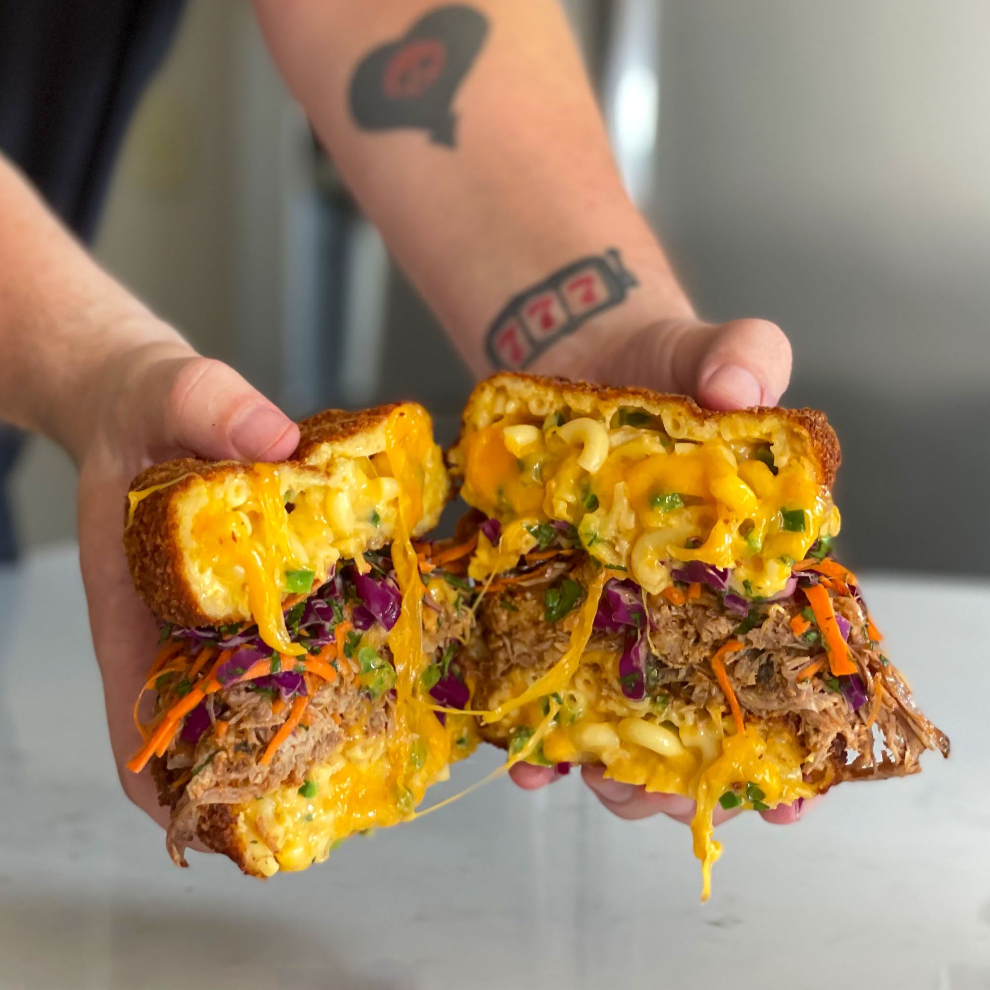 The Pulled Pork Sandwich With a Deep Fried Macaroni and Cheese Bun